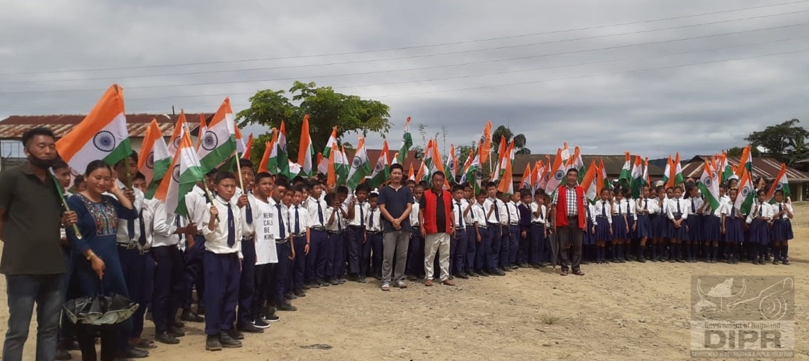 Students participating at the ongoing 'Har Ghar Tiranga' campaign 'Prabat Pheris' morning procession at Tening