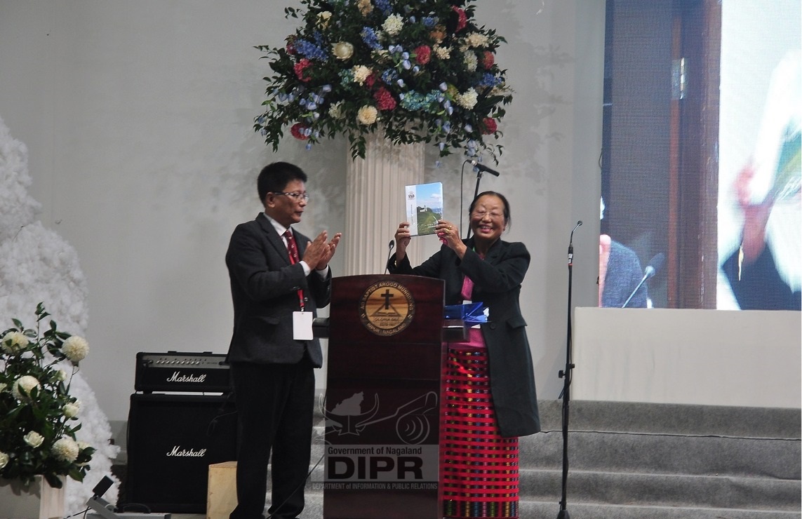L. Bendangla Jamir releasing the ABAM Sesquicentennial Celebration Souvenir at Impur